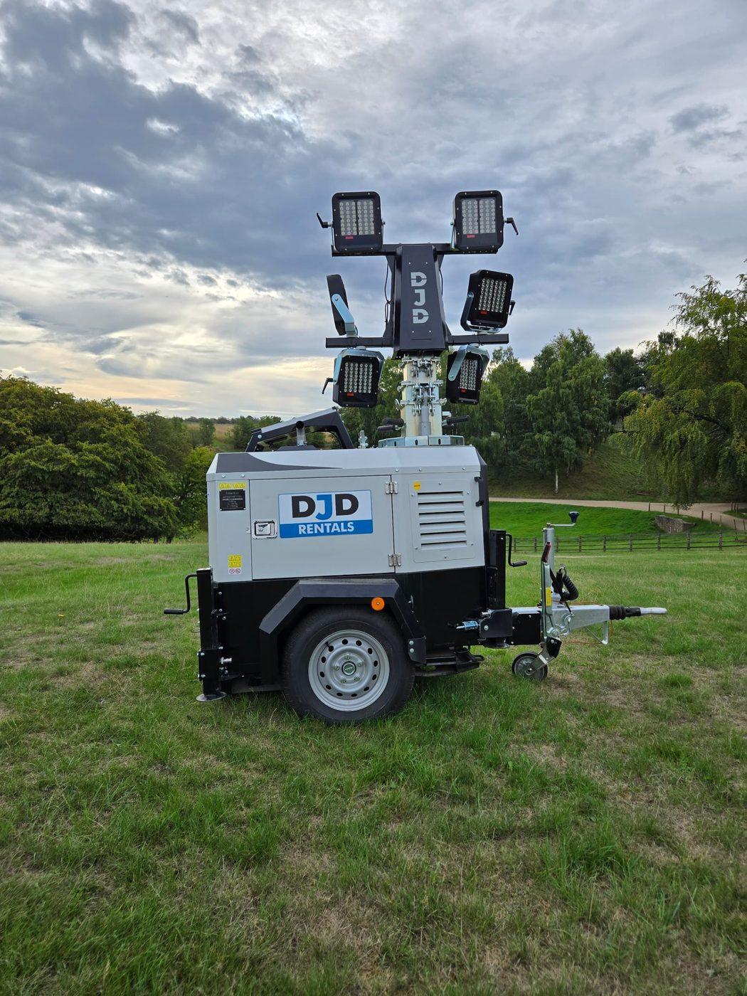 Hybrid lithium tower light running silently beside a campsite